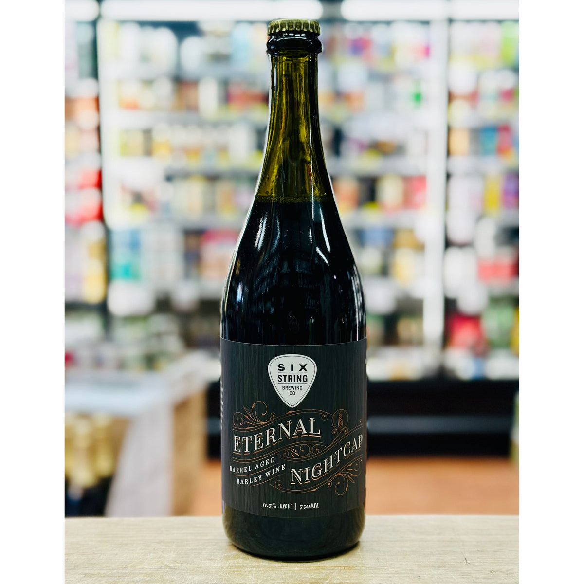 MIX 6 OR MORE GET 20% OFF' SIX STRINGS BREWING ETERNAL NIGHTCAP BARREL AGED BARELY WINE 11.7% ABV 750mL
